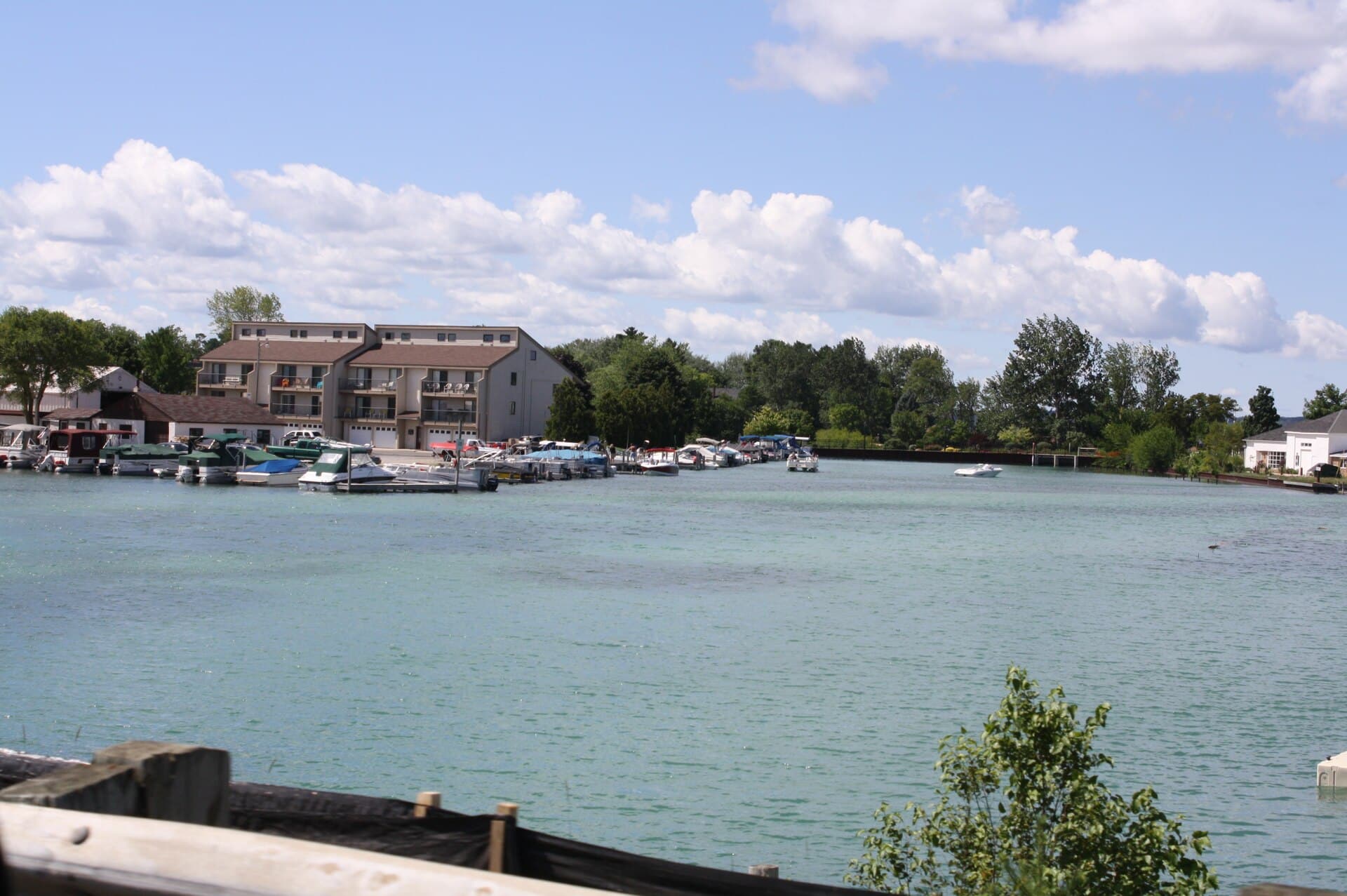 The Elk River waterfront in Elk Rapids, Michigan, seen from US-31 &mdash; CFH Insurance Consultants group health insurance and employee benefits consulting for Elk Rapids, MI employers